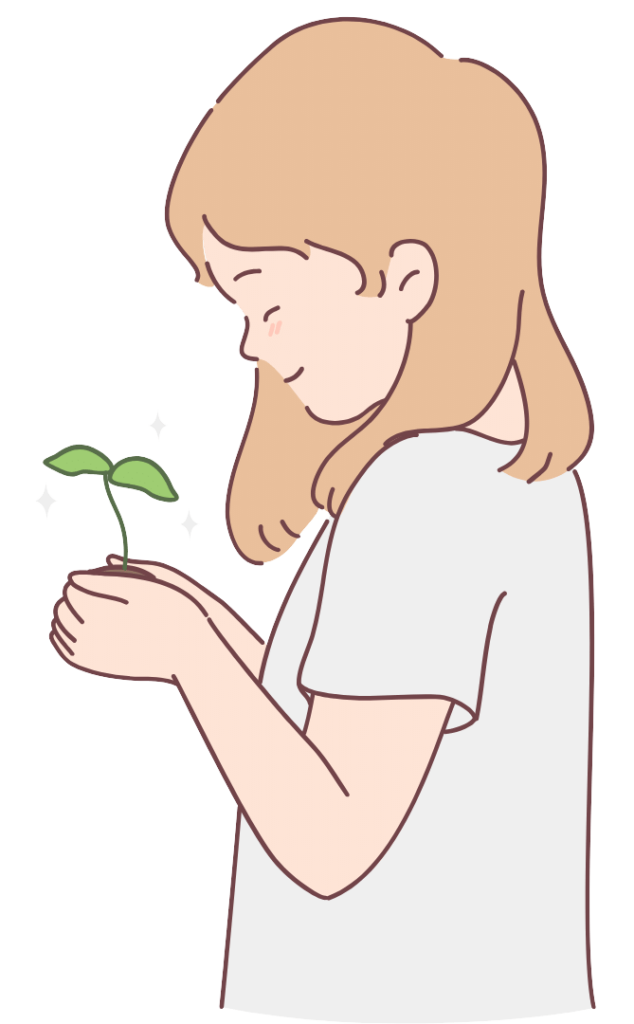 Enfant heureux avec une plante